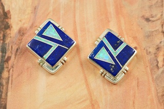Genuine Blue Lapis inlaid in Sterling Silver. Beautiful Fire and Ice Lab Opal Accents. Post Earrings Created by  Navajo Artist Rick Tolino. Signed by the artist. 